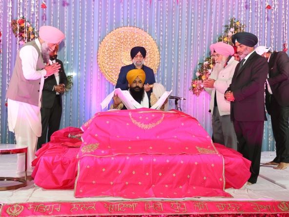 AGI Managing Director Sukhdev Singh attending the presence of Sri Guru Granth Sahib.